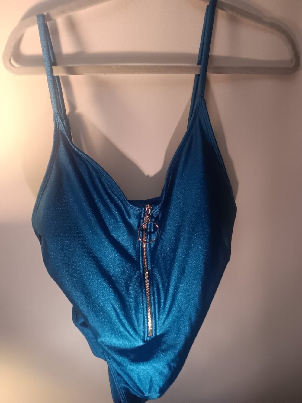 No boundaries Teal one piece Tank style swimsuit with Zipper accent in front.siz